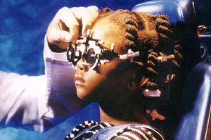 child getting eye exam, image source: National Eye Institute