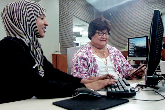 Community Health Worker Maria Reyes and Interpreter Sahra Ali