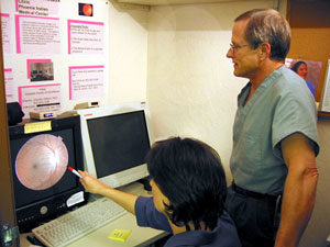Dr. Mark Horton reviewing a retinal image.