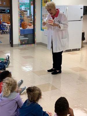 children participating in an oral hygiene lesson