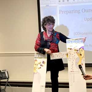 Public health expert presenting at library