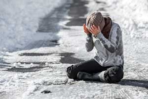 woman who has fallen on ice