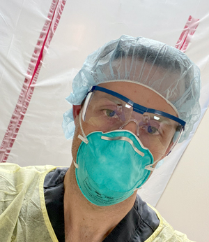 Dr. Drew Miller in his personal protective equipment.