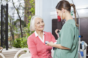 patient getting blood pressure checked