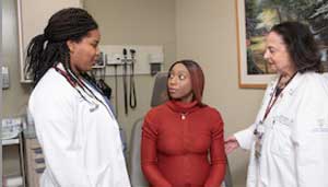 Medical student, patient, and faculty at Katz’s Women’s Hospital, a training site for the Donald and Barbara Zucker School of Medicine.