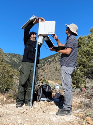 Greg McCurdy and Yeongkwon Song install air quality monitoring station